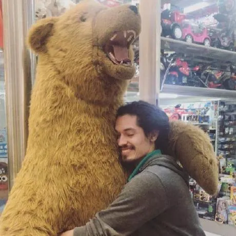 Me hugging a big toy bear